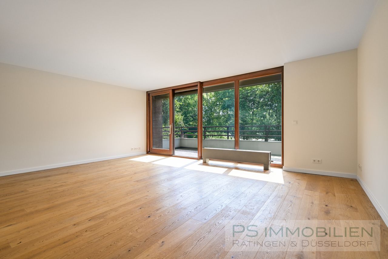 Wohnzimmer mit offener Küche